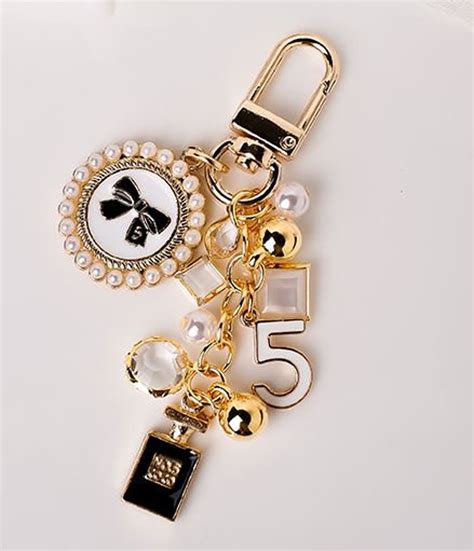 chanel key ring|Chanel fluffy keychain.